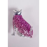A 925 silver brooch in the form of a cat, set with coloured cubic zirconia, 1½" high