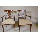 A pair of Victorian inlaid mahogany parlour chairs, with pierced heart shaped splat backs and open