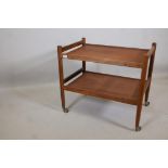 A 1970s teak two tier hostess trolley, 28" x 19" x 25" high