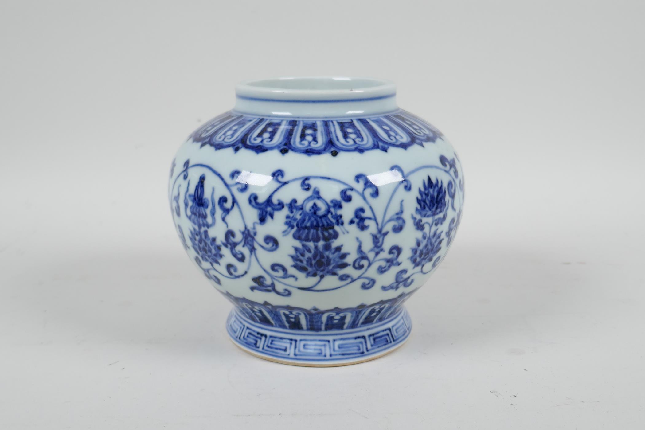 A Chinese blue and white porcelain jar decorated with the eight Buddhist treasures and lotus