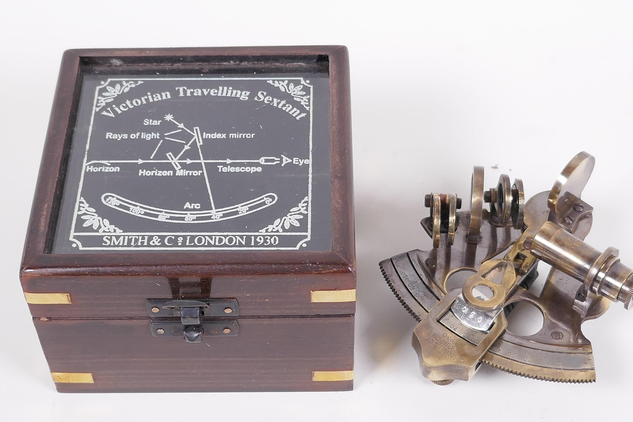 A replica brass travelling sextant in a hardwood case, 4½" square