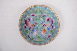 A polychrome enamelled porcelain cabinet dish decorated with Asiatic birds and flowers, 6