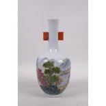 A famille verte porcelain vase with two lug handles, decorated with a riverside landscape, Chinese