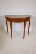 A C19th mahogany demi lune card table, raised on square tapering supports, 36" x 17" x 29"