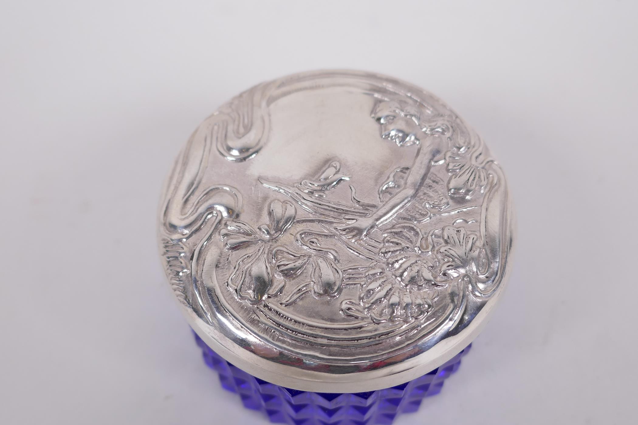 A circular sterling silver lidded blue glass trinket box, the lid embossed in the Art Nouveau style, - Image 2 of 3