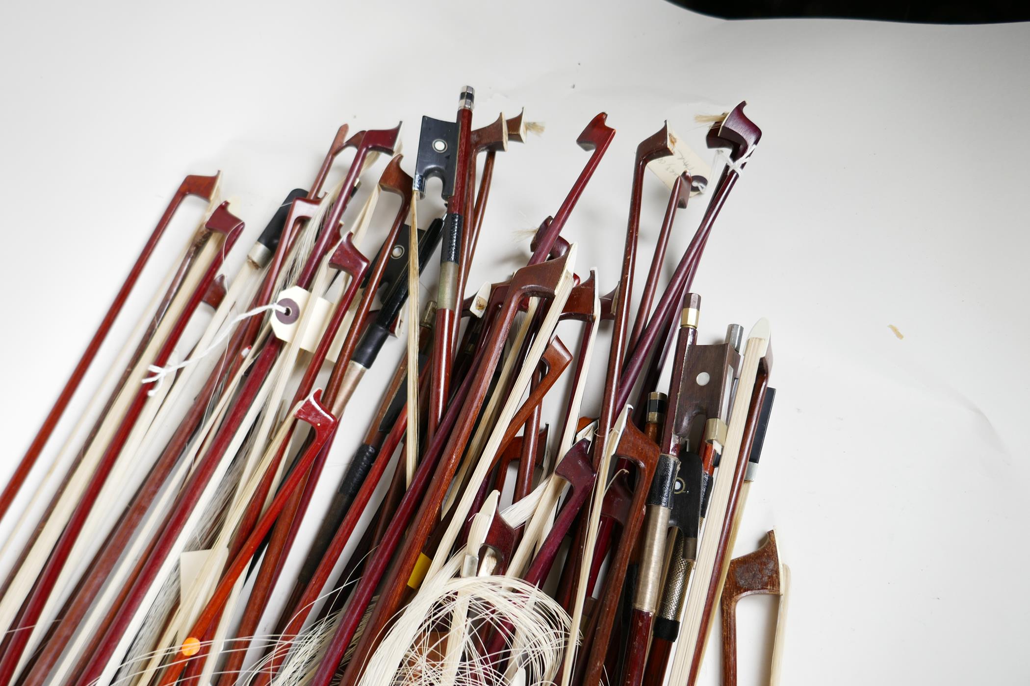 A box containing over fifty violin bows, varying lengths, mostly for restoration - Image 3 of 4