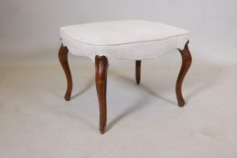 A C19th walnut stool, with shaped top, raised on cabriole supports, 24" x 20" x 18"