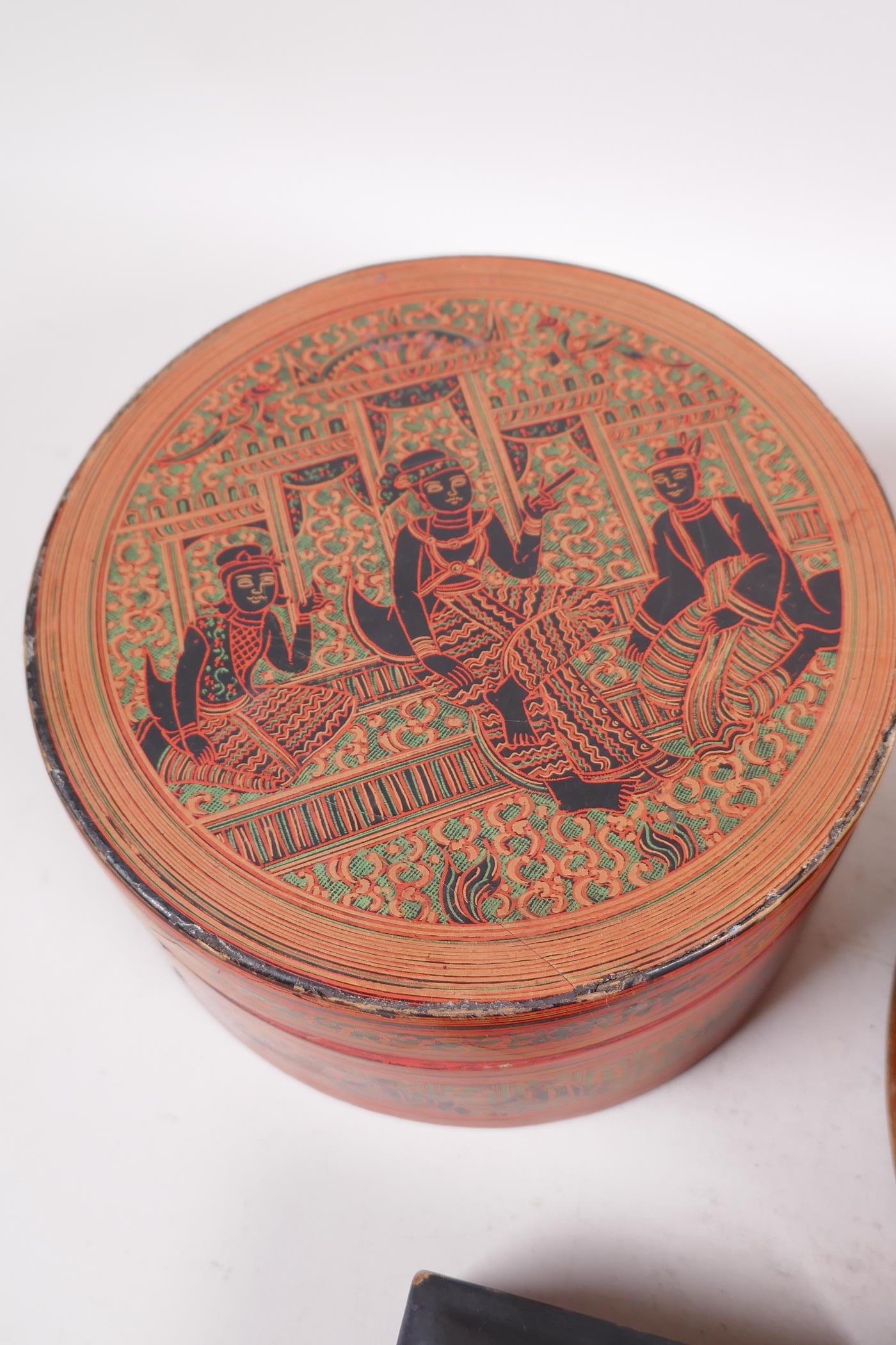 A Burmese turned and painted circular box and cover, 10½" diameter, together with an Indian circular - Image 2 of 4