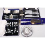 A boxed set of six tea knives with hallmarked silver handles, a box of cake forks from J. Dixon, a