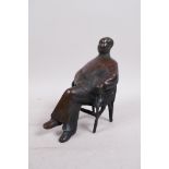 A bronze figure of Chairman Mao, seated, 7" high