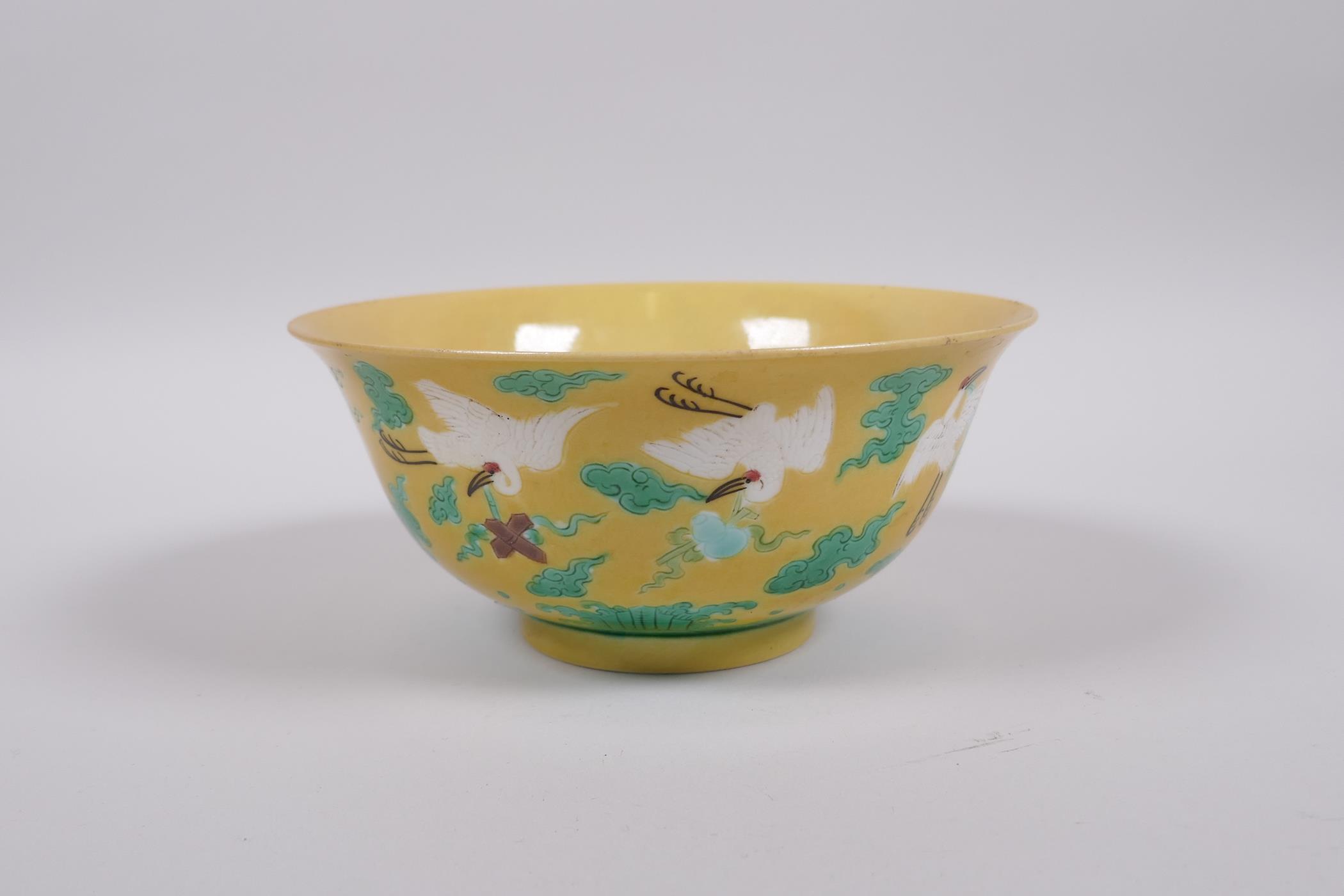 A Chinese yellow ground porcelain rice bowl decorated with red crowned cranes in flight, 6 character - Image 3 of 8