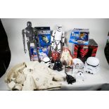 A collection of Star Wars toys and ephemera including K-2SO and First Order storm trooper figures,