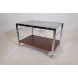 An MDA chrome, faux rosewood and smoked glass tea trolley by Howard-Miller Ltd, 24" x 16½", 16½"