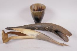 An Ethiopian carved horn beaker, 5" high, together with a carved horn crocodile and another of a