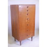 A mid C20th tallboy chest of seven drawers, by Meredew, 47" x 24" x 18"