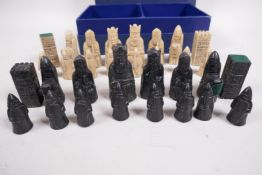 A resin figural chess set from the London Chess Centre, kings 2½" high