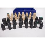 A resin figural chess set from the London Chess Centre, kings 2½" high