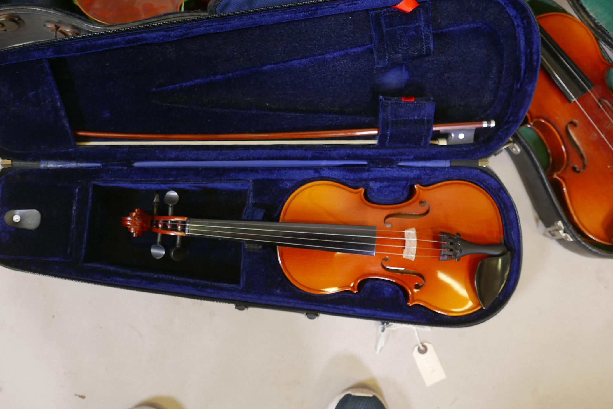 Eight violins for restoration, various states of disrepair, and including several good carry cases - Image 3 of 9