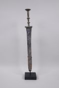 A Chinese archaic style bronze dagger/short sword on a display mount, 15" high without mount