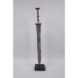 A Chinese archaic style bronze dagger/short sword on a display mount, 15" high without mount