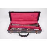 A vintage 'Selmer Console' steel ebonite clarinet, in a fitted travel case, 15½" x 5½"