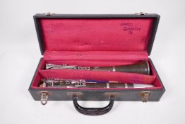 A vintage 'Selmer Console' steel ebonite clarinet, in a fitted travel case, 15½" x 5½"