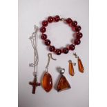 A collection of amber jewellery with silver mounts