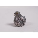 A novelty miniature sterling silver figure of a chick, 1"