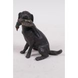 A cold painted bronze figure of a labrador gun dog with pheasant in its mouth, 3½" high