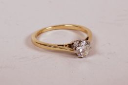 A 9ct yellow gold and platinum solitaire diamond ring, 0.5ct, 2.8g, size 'N'