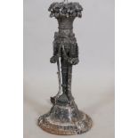 A C19th wood table lamp, well carved with floral swags and winged putti, drilled for electricity,