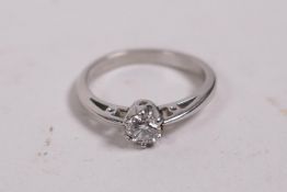 A platinum and diamond solitaire ring, approx 0.2ct, 3.7g, size K/L
