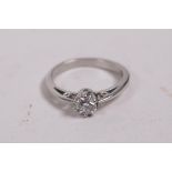 A platinum and diamond solitaire ring, approx 0.2ct, 3.7g, size K/L