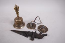 A Sino-Tibetan metal bell with vajra decoration to handle, a pair of matching cymbals, and an iron