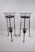 A pair of glass and wrought iron hurricane vases, 17" high, A/F chips to rim