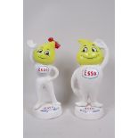 A pair of replica cast iron advertising money boxes for Esso Petroleum, 'Andy and Abby Slick', 9½"