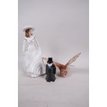 A Royal Worcester porcelain figurine 'Birthday Wish', together with a candle snuffer 'The Artful