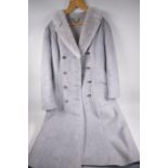 A ladies' 'Real Lamb Skin' double breasted coat, approximate size 14, from Woolea lambskin