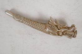 A Chinese white metal cheroot holder cast in the form of a dragon, character mark to base, 4" long