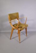 A mid C20th beechwood open arm desk chair, seat A/F