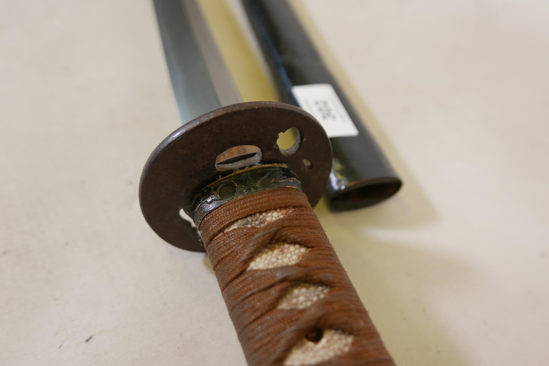 An antique Japanese sword, probably C17th, with later shagreen handle, brass menuki and iron - Image 5 of 9