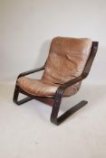 A Bentwood and brown leather cantilever chair, Noboru Nakamura, circa 1970