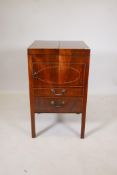 A George III inlaid mahogany washstand with fold out top revealing fitted wells, and pot cupboard