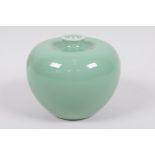 A Chinese porcelain green glazed, apple shaped vase with slender neck, 3¼" high