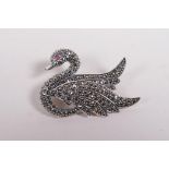 A 925 silver and marcasite set brooch in the form of a swan, 2½" wide