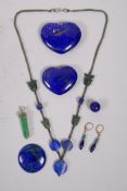 A quantity of lapis stones, pendants, beads etc, largest 2"