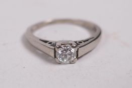 An 18ct white gold diamond solitaire ring, approx 0.2ct, 2.5g, size J