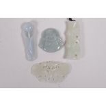 Four Chinese celadon jade pendants, carved in the form of bamboo, butterfly, Buddha and a flower,