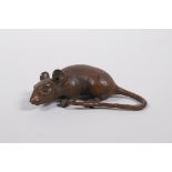 A Japanese Jizai style bronzed metal rat, indistinct impressed mark to base, 3½" long