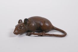 A Japanese Jizai style bronzed metal rat, indistinct impressed mark to base, 3½" long